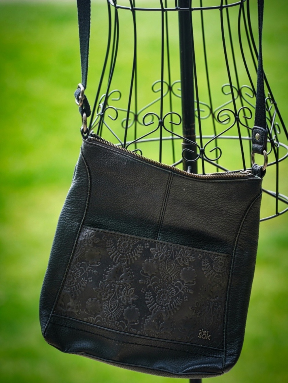 The Sak Lucia Black Pebbled Leather Floral Embossed Crossbody Purse Bag
